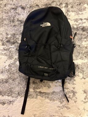 The North Face Jester Luxe Backpack in Black with Rose Gold Accents